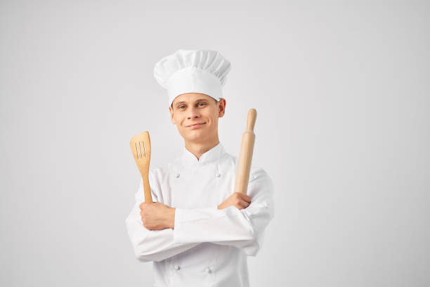 istock male chef in uniform restaurant work cooking 2054014404