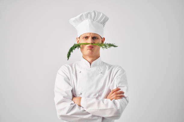 istock man chef's uniform nose green kitchen restaurant professional 2054022809