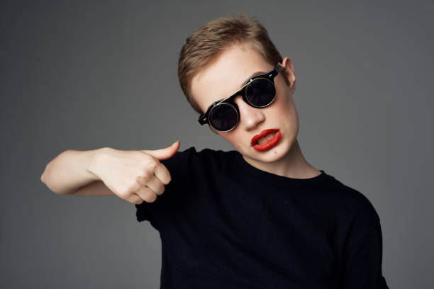 pretty woman hand gesture Red lips glamor isolated background. High quality photo