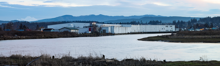 Stanwood WA USA Feb 17, 2024 Panorama of Twin City Foods along the Stillagumish River in Stanwood