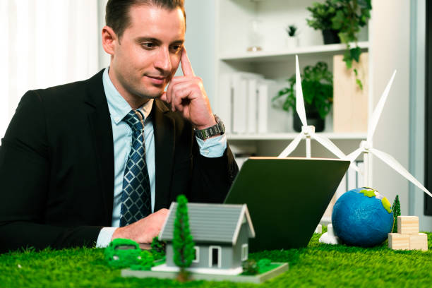 istock Businessman planning on his laptop with ECO strategy. Quaint 2054099209