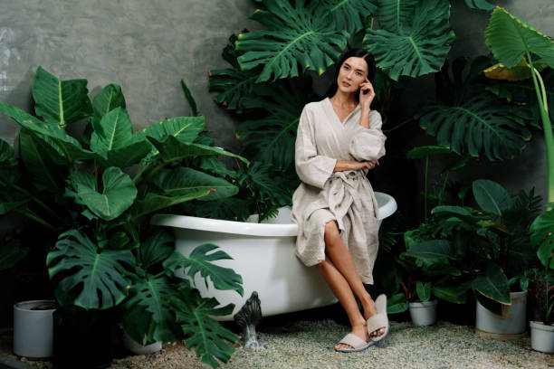 istock Tropical and exotic spa garden with bathtub in modern hotel or resort. Blithe 2054143582