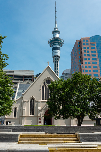 Auckland, New Zealand - January 28, 2023 - Cathedral of St. Patrick in Auckland, the Skytower in the background, New Zealand