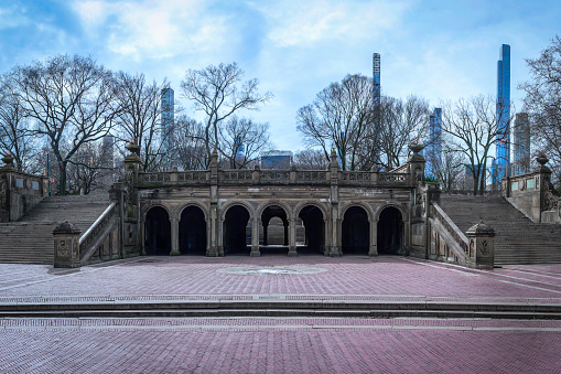 Bethesda Terrace, Bi-level lakeside balcony plaza and arching passageways on a dramatic cloudy winter day in Central Park, Manhattan, New York City, USA