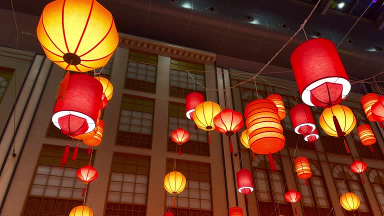 Colorful lanterns hang over corridor