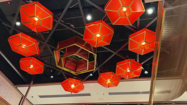 Colorful lanterns hang over corridor