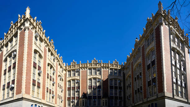 istock Magnificent historic Gothic style architecture with stone arches built for public school in early 1900s in Brooklyn, New York, USA 2054220538