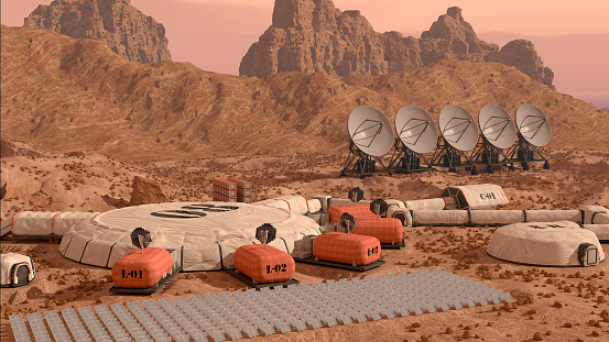 Mars colony base camp, with habitation domes, rovers, research facilities, labs, and communication antennas. 3D rendered illustration.