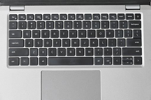 Top view of a laptop keyboard and touch pad