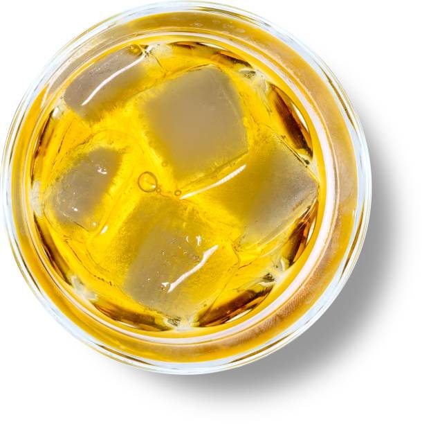 istock Close up view whiskey with ice rocks isolated on plain background. 2054297734