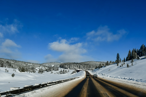 Traveling West on I-70 through the Colorado Mountains on a Beautiful Winter Morning in February