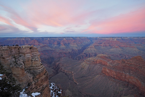 Pink clouds over Grand Canyon at sunset from Mather Point in Grand Canyon National Park, Arizona.
