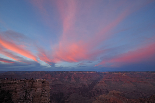 Pink clouds over Grand Canyon at sunset from Mather Point in Grand Canyon National Park, Arizona.