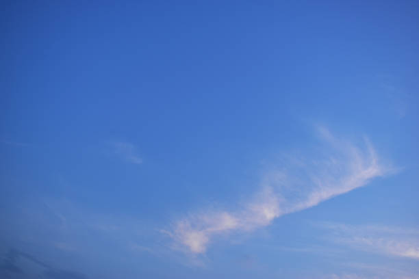 istock beautiful blue sky and white fluffy cloud with in the evening, natural background 2054535055