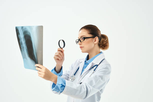 istock nurse examine x-ray hospital professional 2054536101
