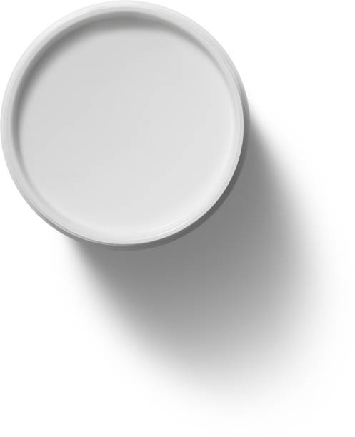 istock Close up view isolated of white creme ceramic pot. 2054539269