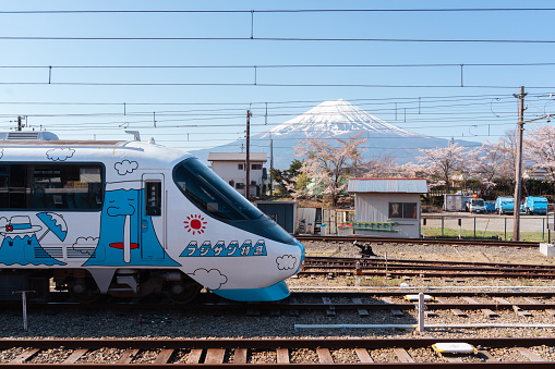 Yamanashi, Japan - April 9, 2023 : Kawaguchiko railway station platform and Fuji Mountain at spring