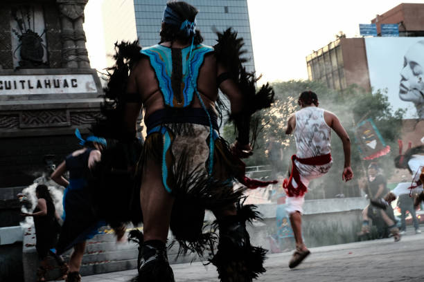 Mexico City, Mexico - February 24, 2024: Ancient rituals Aztecs perform during the Cuauhtemoc anniversary celebration in Mexico City.