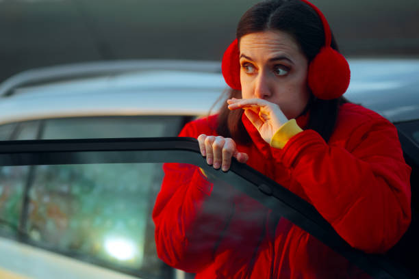 istock Woman Getting out of a Car Feeling Motion Sickness 2054556675