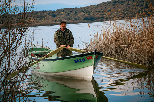 Bursa Turkey 9 April 2019: Uncle Fisherman Adem of Bursa Eskikaraagac Village. Uncle Adem is friends with storks and feeds them every year when they migrate.