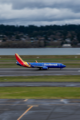 Southwest Airlines taking off the runway at Portland International Airport.