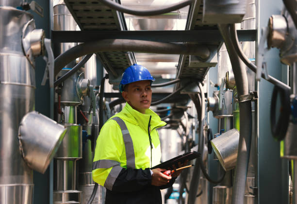 istock The smart mechanical engineer inspects the HVAC system stands for heating, ventilation, and air conditioning technology in the basement of the factory 2054628960