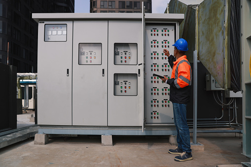 The electrical engineer checks and inspects at MDB panel (Main Distribution Board ) in the Substation building, daily and checks the electric switchboard on the Main Distribution Boards of the factory