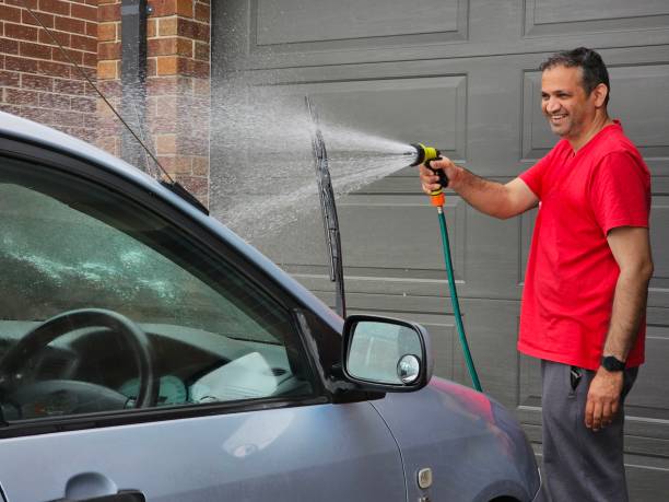 istock A Man is Washing his Car. Melbourne - Australia. 2054673221