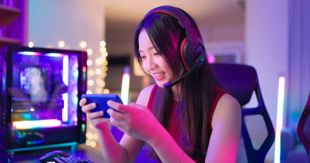 istock asian female smartphone cyber sport 2054690284