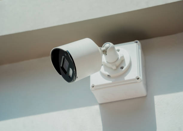 istock Modern CCTV camera on a wall of a residential building 2054693161
