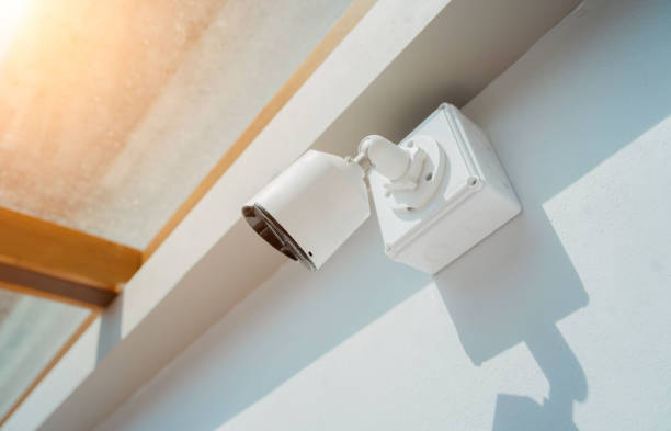 istock Modern CCTV camera on a wall of a residential building 2054696370
