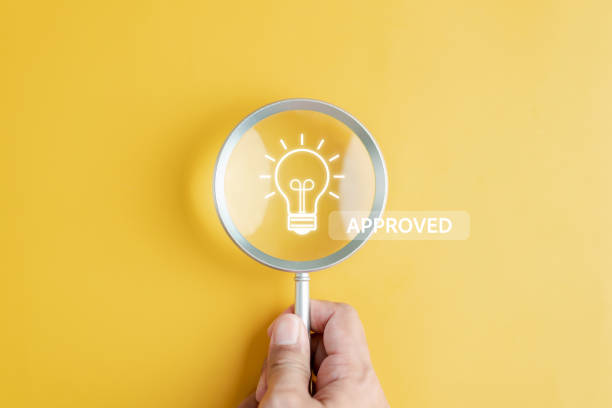istock Idea approved project in corporate concept. Light Bulb icon inside magnifier create new idea business motivation in future. 2054738951