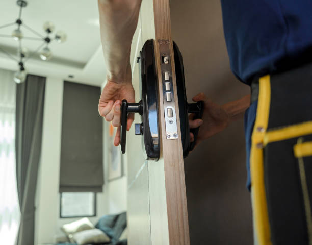 istock A technician installs a modern smart door lock on the wood door 2054760255