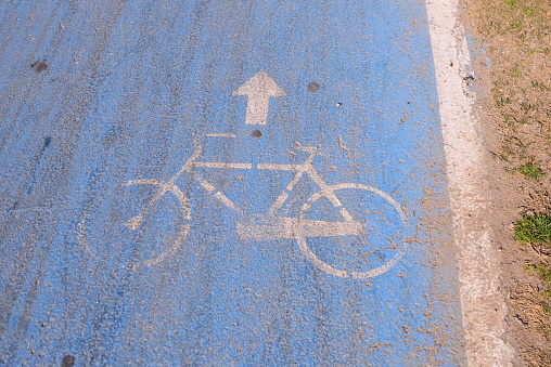 Red triangle and blue round bicycle sign on the cycle lane in the netherlands