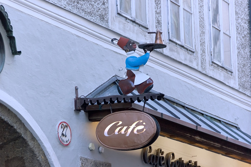 Salzburg, Austria- 13 January 2024: Guild sign in the historic city center of Salzburg, Austria.