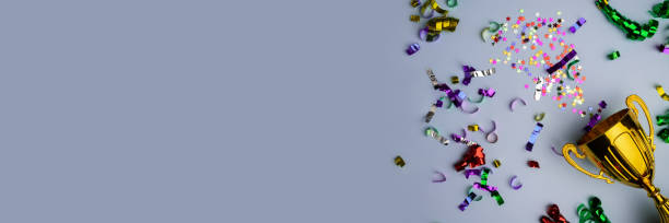 istock Success trophy, confetti backdrop, champion's victory, winning achievement 2054787321