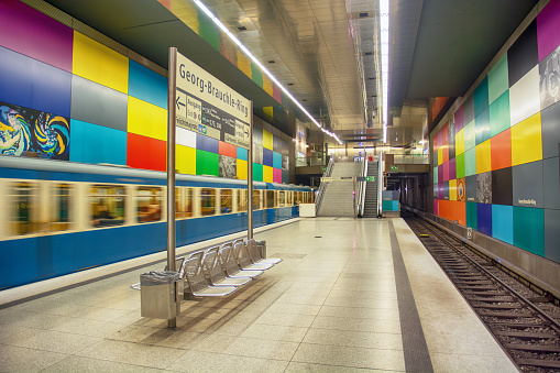 Munich, Germany - 15 JUNE 2018: U Bahn underground train station with people walking up on the old style train in Munich City Germany