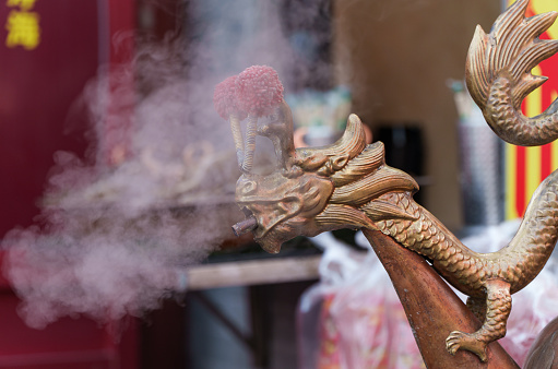 Traditional Chinese style dragon shaped boiling kettle emits the steam