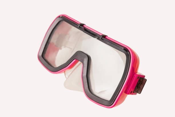 Pink plastic diving and scuba mask isolated on white background
