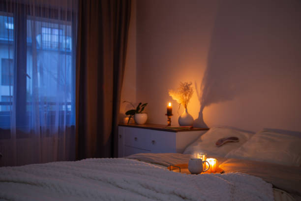 istock cup of tea in bedroom at night 2054861070
