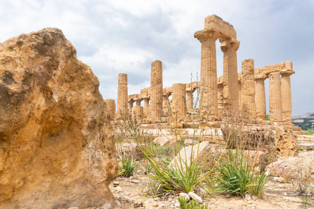 Agrigento, Italy-May 10, 2022:the imposing Greek Temple of Juno inside the Valle di Templi archaeological park near Agrigento during a sunny day