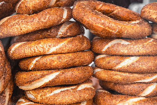 Traditional tasty Turkish bread semit withe sesame seeds sold everywhere across Turkey and popular for breakfast. Turkish breakfast. National food semite bun. Turkish Bagel Simit withe sesame seeds
