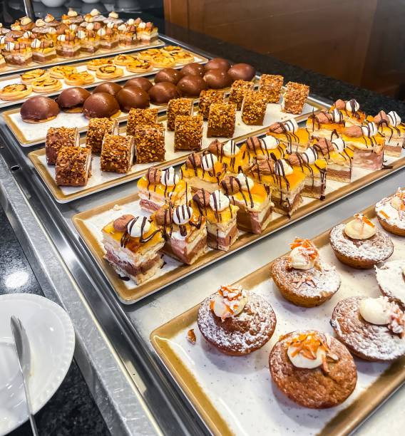 istock Assortment of small cakes and sweets at a hotel buffet. 2054976868