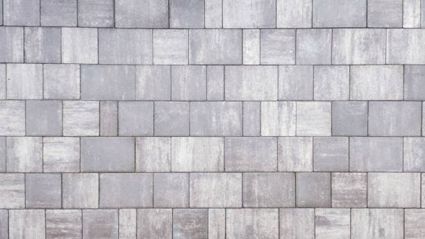 istock Closeup of a gray textured surface made from paving stones. 2055022652