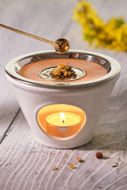 istock Burning various types of incense in an incense burner with tea light 2055023725