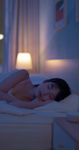 istock asian woman night sleep deeply 2055028115