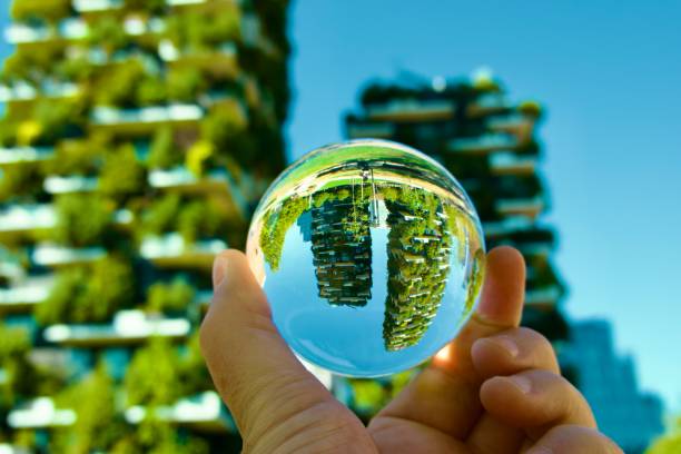 istock Crystal ball against skyscrapers 2055029678