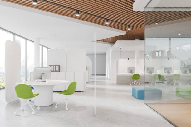 istock White office interior with consulting and relax zone, panoramic window 2055036608