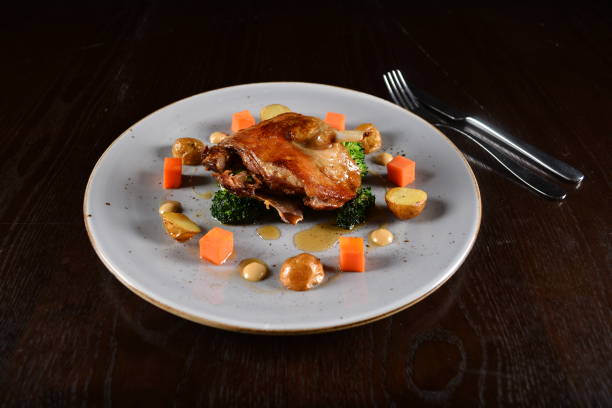 istock chef western marinated grilled duck leg confit with vegetables and sauce main course in plate on white table western restaurant asian halal cafe hotel menu 2055063017