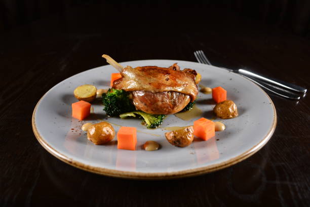 istock chef western marinated grilled duck leg confit with vegetables and sauce main course in plate on white table western restaurant asian halal cafe hotel menu 2055064590